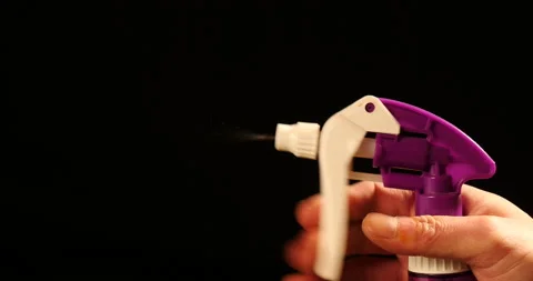 Spray bottle with jet of water Stockbeeldmateriaal 162610607