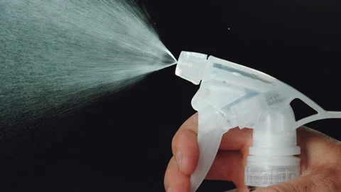 Spray bottle moisture slow motion Video stock 158123506
