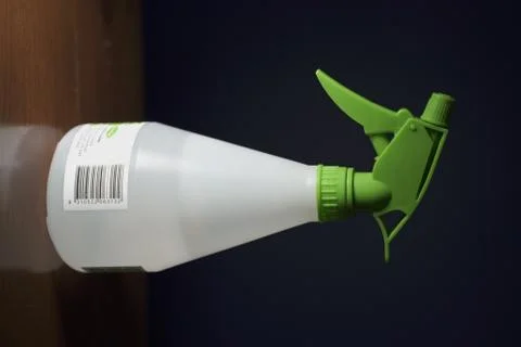 Spray bottle with sanitiser 库存照片