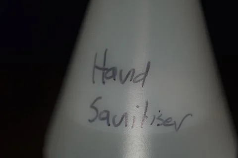 Spray bottle with sanitiser 库存照片