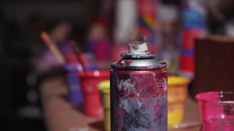 Spray can with paint in the artist's studio during work Stock Footage 231168705