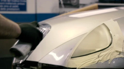 Spray on car headlight Stock Footage 86238791