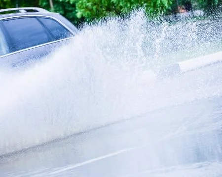 Spray from the car Stock Photos