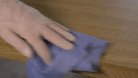 Spray disinfectant to disinfect the table surface Stock Footage 125433149