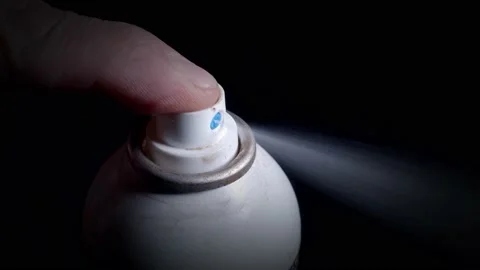 Spray out slow motion dark background Stock Footage 144957268