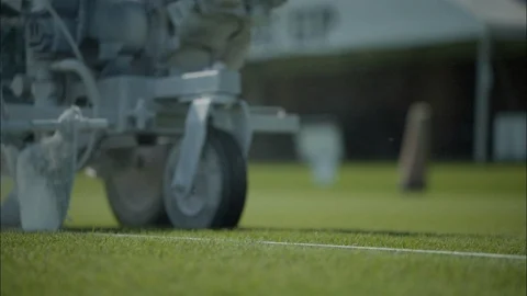 Spray paint machine spraying line on football field Stock Footage 105424160