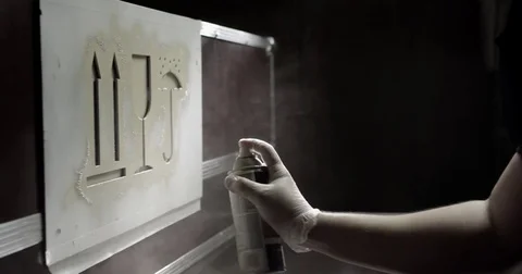 Spray painting in slow motion Stock Footage 77076141