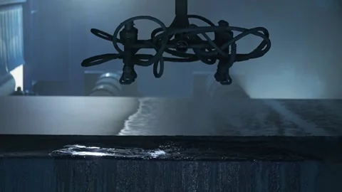 A spray painting system is applying coating to a steel plate 스톡 동영상 308757162