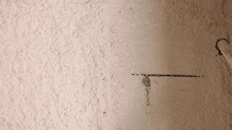 Spray plaster, Texture application, Block wall Stock Footage 330012642