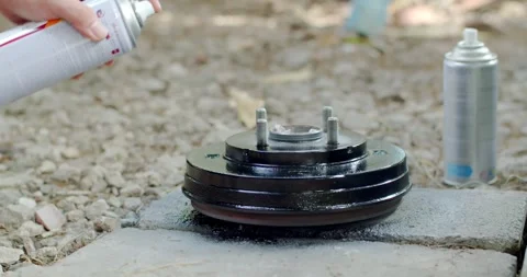 Spray a second layer of black paint after the primer. Stock Footage 267025001