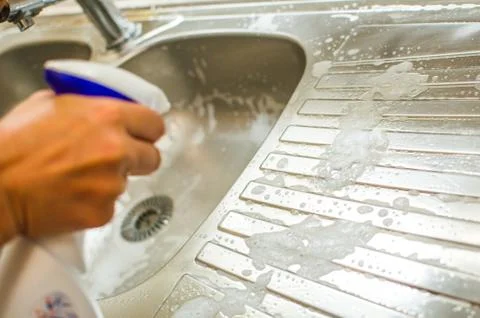 Spray on sink Stock Photos