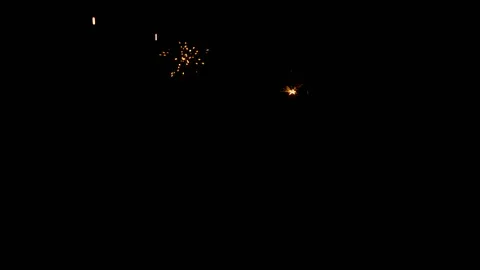 Spray of sparks on black background Stock Footage 121629869