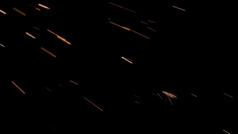 Spray of sparks on black background Stock Footage 121631672