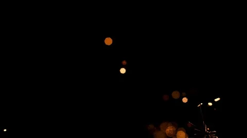 Spray of sparks on black background Stock Footage 121635787