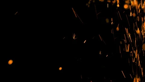 Spray of sparks on black background 스톡 동영상 121636040