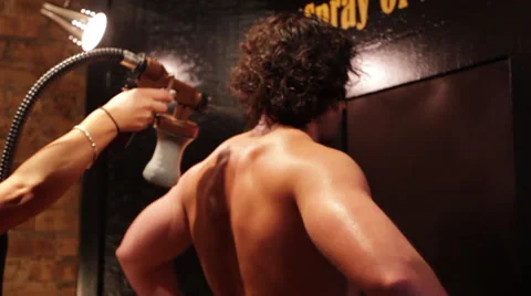 Spray Tan Stock Footage 28588533