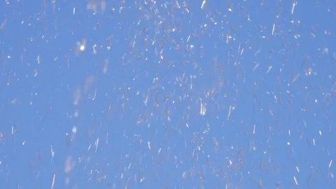 Spray water on the background of the sky. Close-up of fountain water droplets Stock-Footage 80597294