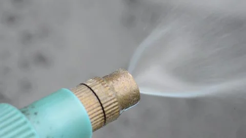 Spray of water on blurred dark background Stock Footage 295036902