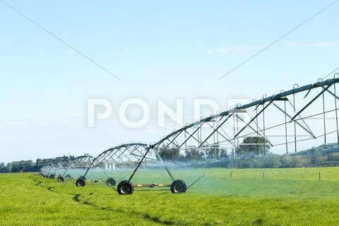 Spray Water Machine In Grassland