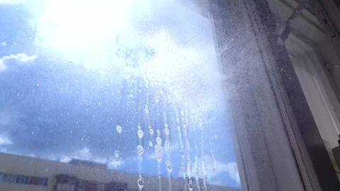 Spray on windows, spray on windows, cleaning windows glass,cleaning close-up. Stock Footage 310872150