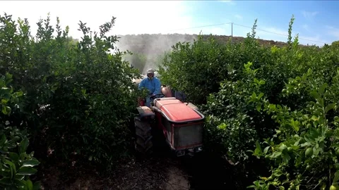 A sprayer machine, trailed by tractor spray herbicide, insecticide, pesticide. Stock Footage 138085322