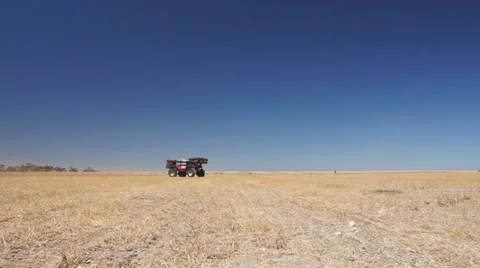 Sprayer moving on farm field Stock Footage 20490090
