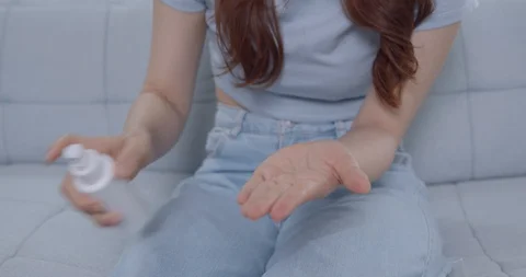 Spraying Antiseptic Solution On Hands Video stock 127693078