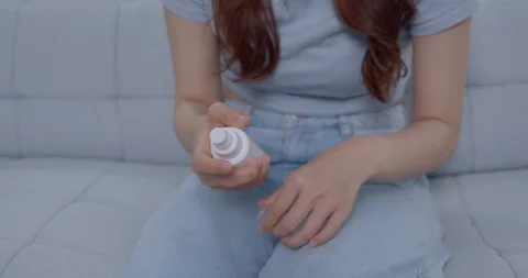 Spraying Antiseptic Solution On Hands Video stock 127693112