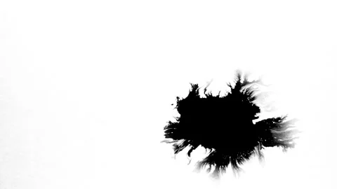 Spraying black paint on a white background Stock Footage 303171570