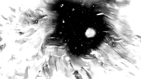 Spraying black paint on a white background Stock Footage 303171574