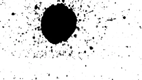 Spraying black paint on a white background Stock Footage 303171582