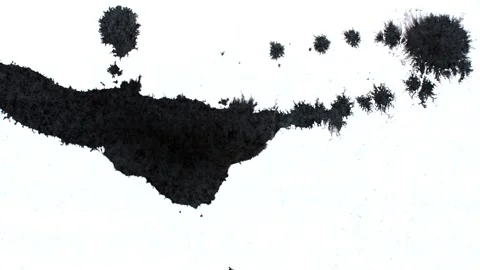 Spraying black paint on a white background Stock Footage 303171601