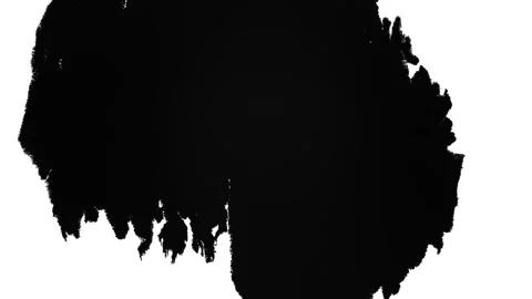 Spraying black paint on a white background Stock Footage 303171769