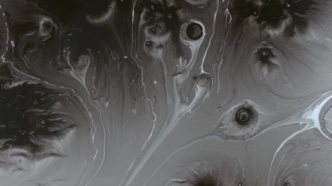 Spraying black paint on a white background Stock Footage 303171801