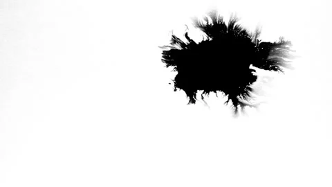 Spraying black paint on a white background Stock Footage 303171839