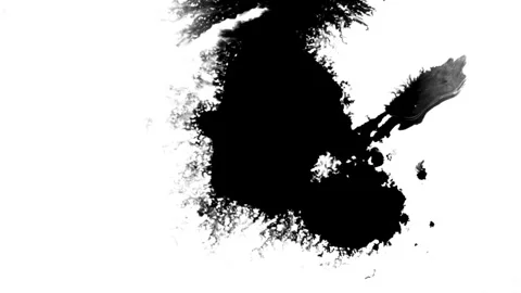 Spraying black paint on a white background Stock Footage 303171850