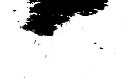 Spraying black paint on a white background Stock Footage 303171900