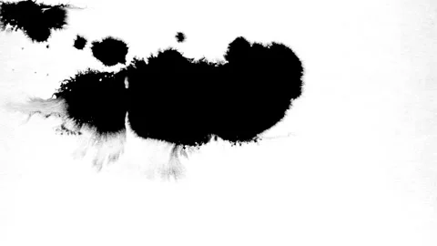 Spraying black paint on a white background Stock Footage 303171901