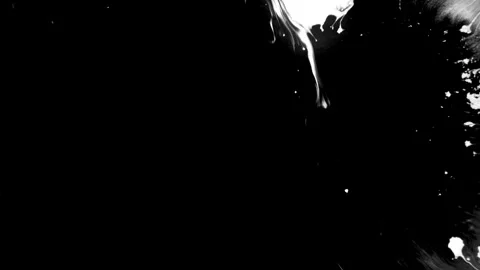 Spraying black paint on a white background Stock Footage 303171923