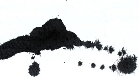 Spraying black paint on a white background Stock Footage 303171931
