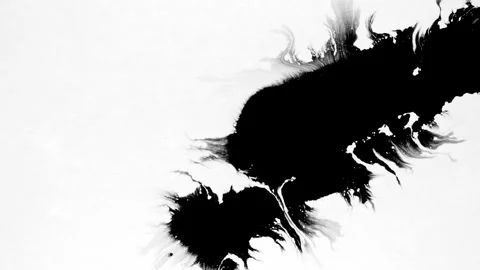 Spraying black paint on a white background Stock Footage 303171935
