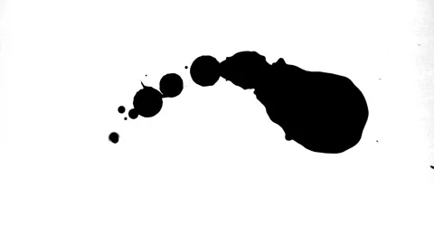 Spraying black paint on a white background Stock Footage 303171943