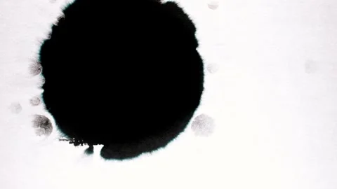 Spraying black paint on a white background Stock Footage 305492611