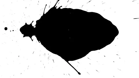 Spraying black paint on a white background Stock Footage 305492650