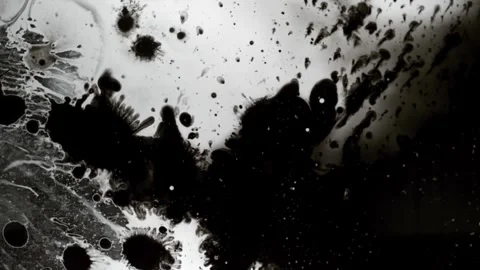 Spraying black paint on a white background Stock-Footage 305492687