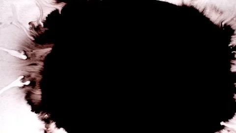 Spraying black paint on a white background 動画素材 305492697