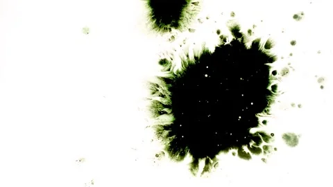 Spraying black paint on a white background 動画素材 305492961