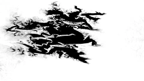 Spraying black paint on a white background 動画素材 305492968