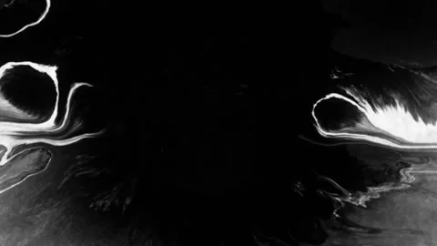 Spraying black paint on a white background Video stock 305493000