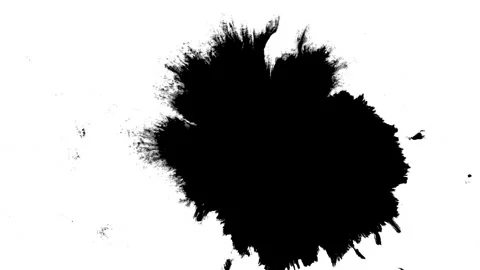 Spraying black paint on a white background Stock Footage 305493005